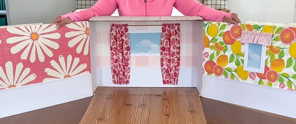 Inside of a modern cardboard fold-out Barbie house based on the 1962 version