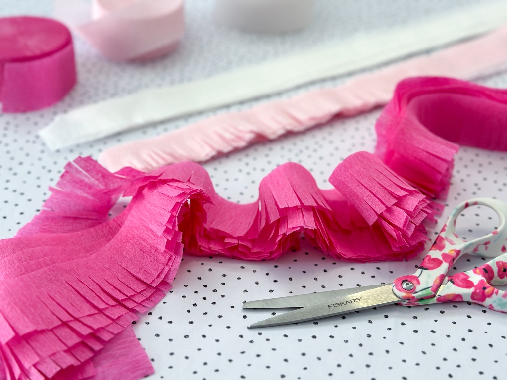 fringed pink crepe paper streamers