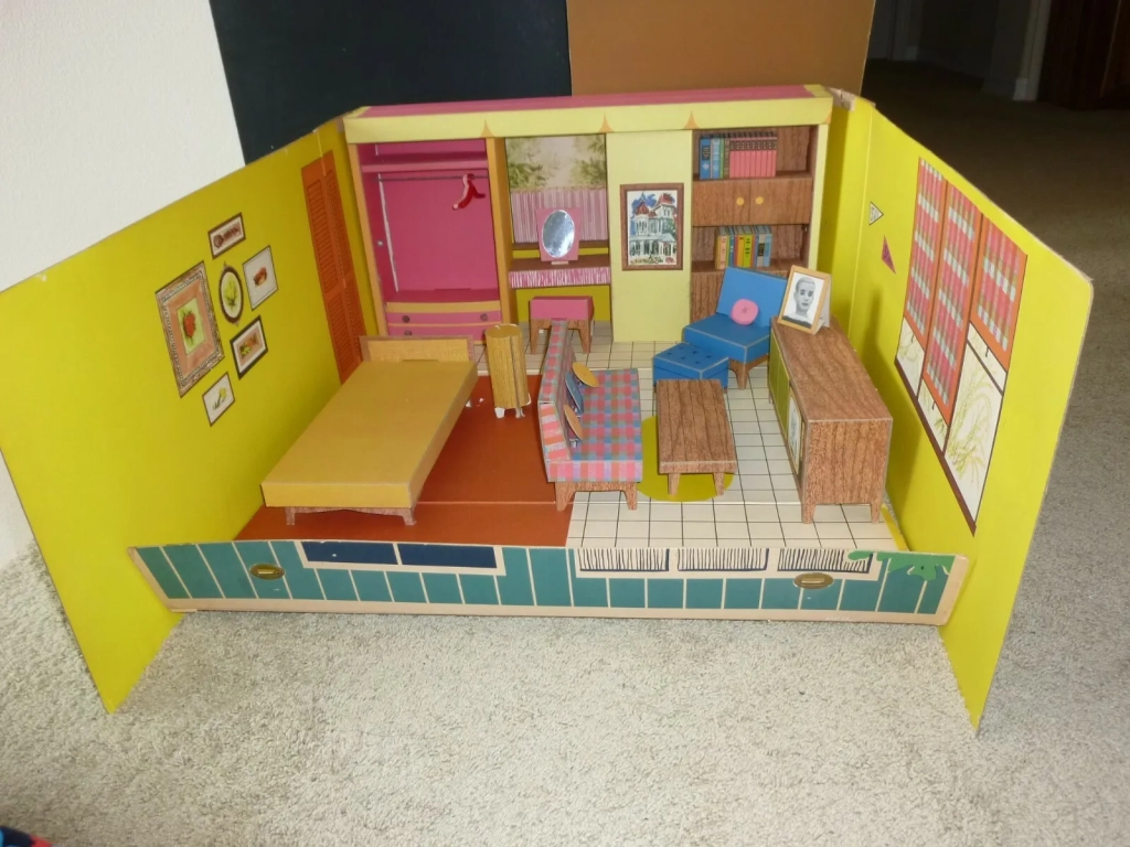 Inside of a 1962 fold-out cardboard Barbie house with cardboard furniture